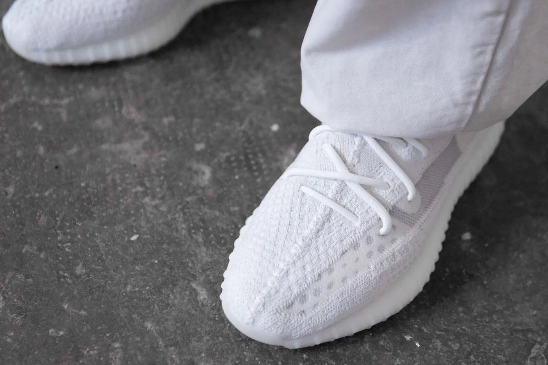 Buy yeezy 350 v2 triple white hotsell